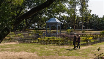 The central, formal gardens are laid out in strict geometrical arrangements and are surrounded by the less formal spaces of the open lawns, woodland areas and meandering paths.